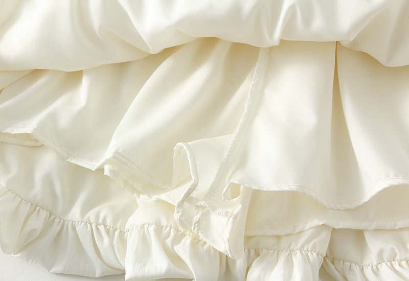 Ivory Puff Mini Skirt with Bow Details